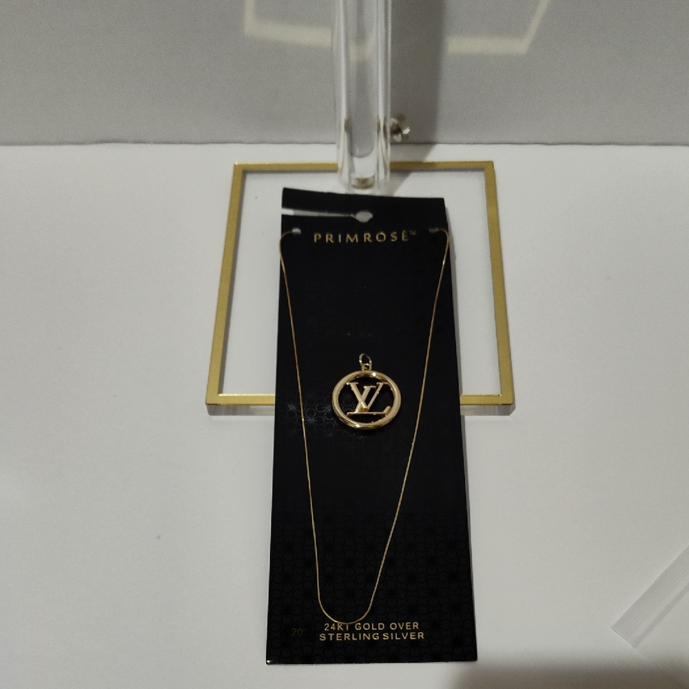 LV Gold Zipper Pull